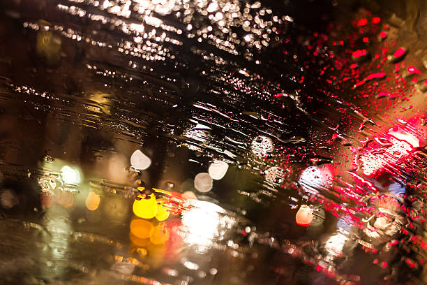 istock Abstract view onto city lights through a car windshield 485421926