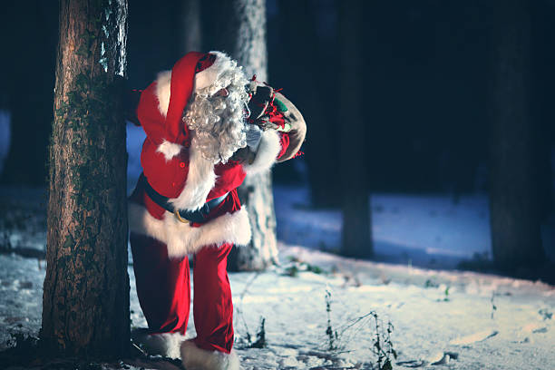istock Santa Claus going through snowy woods. 485425658