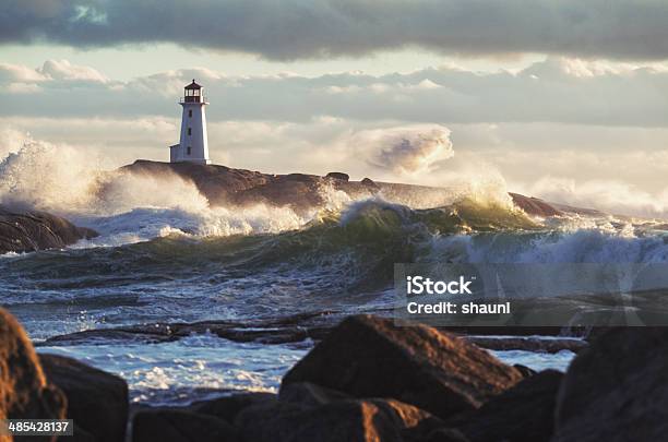 Sunlit Surf Stock Photo - Download Image Now - Lighthouse, Storm, Wave - Water