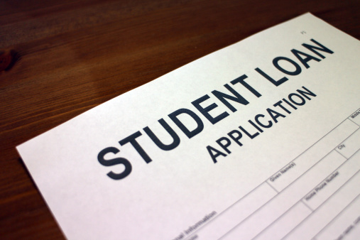 Someone filling out Student Loan Application