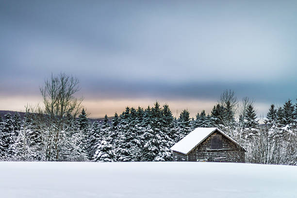 istock Cabin roof over Winter sunset 485428640