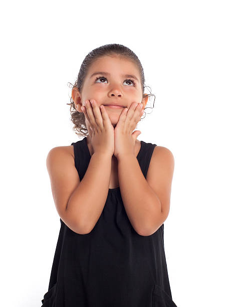 Cute little girl looking up