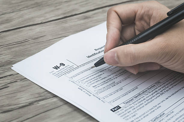 istock Writting tax form 485430028