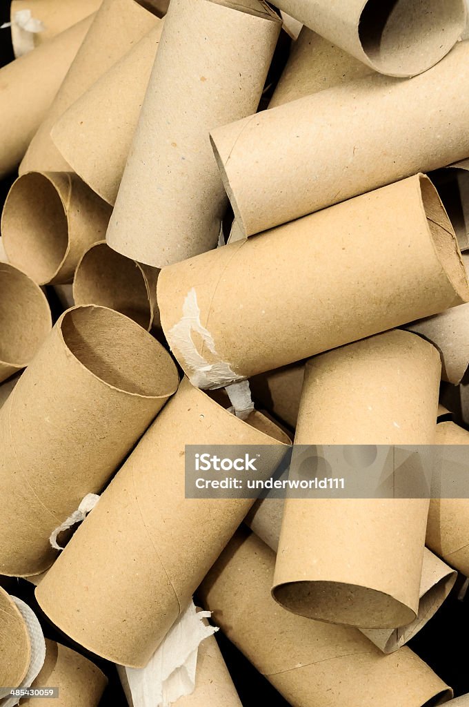 Empty Toilet Paper Roll Empty Toilet Rolls Stack Up On a Black BackgroundEmpty Toilet Rolls Stack Up On a Black Background Backgrounds Stock Photo