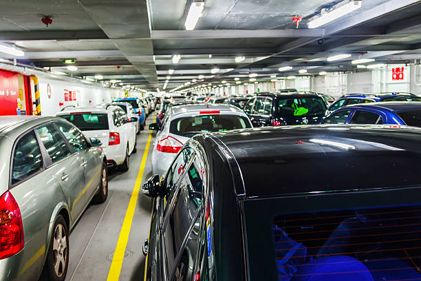 istock rows of cars on a car ferry 485435032