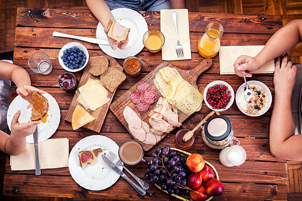 istock Young Happy Family Having Breakfast 485435958