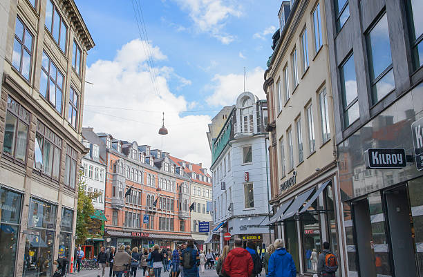 istock People walk down crowd Stroget street Copenhagen, Denmark 485437070