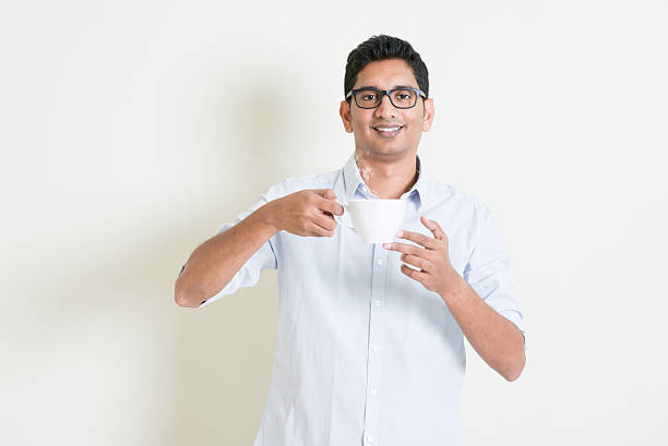 istock Casual business Indian male drinking coffee 485437084