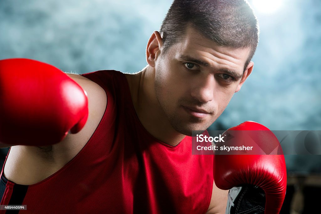 Boxing Player. View Young Boxer In Fighting Stance Looking At Camera Stock Photo - Download ...
