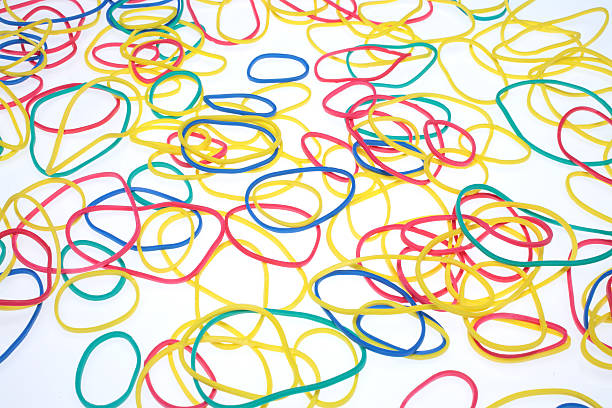 istock lot of colorful rubber bands over white 485444974