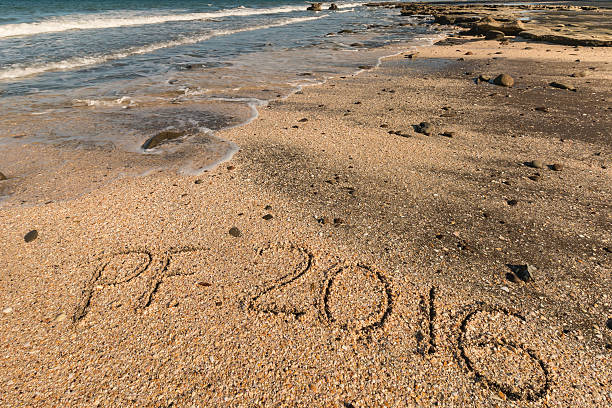 istock New Year's greeting in sand 485446378