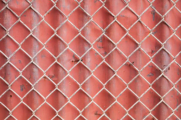 istock Wire Mesh and red corrugated fence 485449441