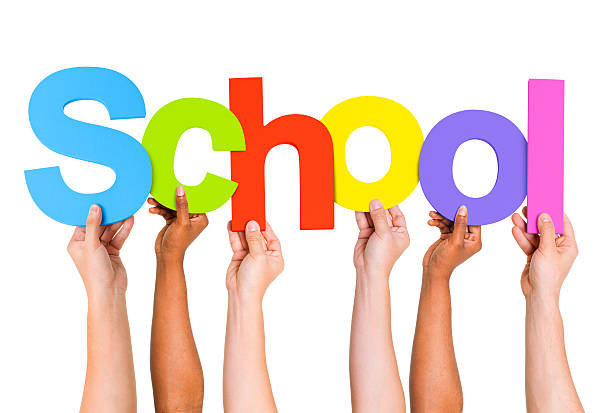 istock Multi Ethnic People Holding The Word School 485450127
