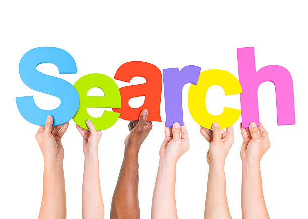 istock Multi-Ethnic Group Of People Holding The Word Search 485450133