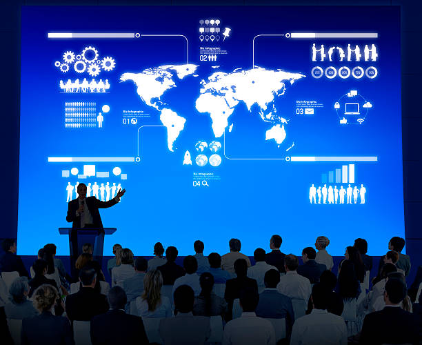 istock Instructor lectures to a crowd of businesspeople 485451255