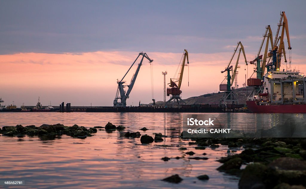 Feodosia, Russia Sunset in the port of Feodosia, Crimea, Russia Artist Stock Photo