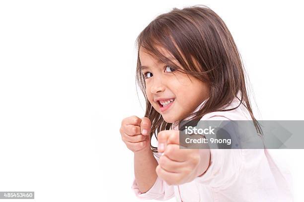 Little Girl Assuming Stance Practicing Martial Arts Selfdefen Stock Photo - Download Image Now