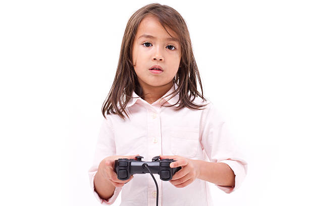 istock frustrated little girl gamer experiencing game over 485454132