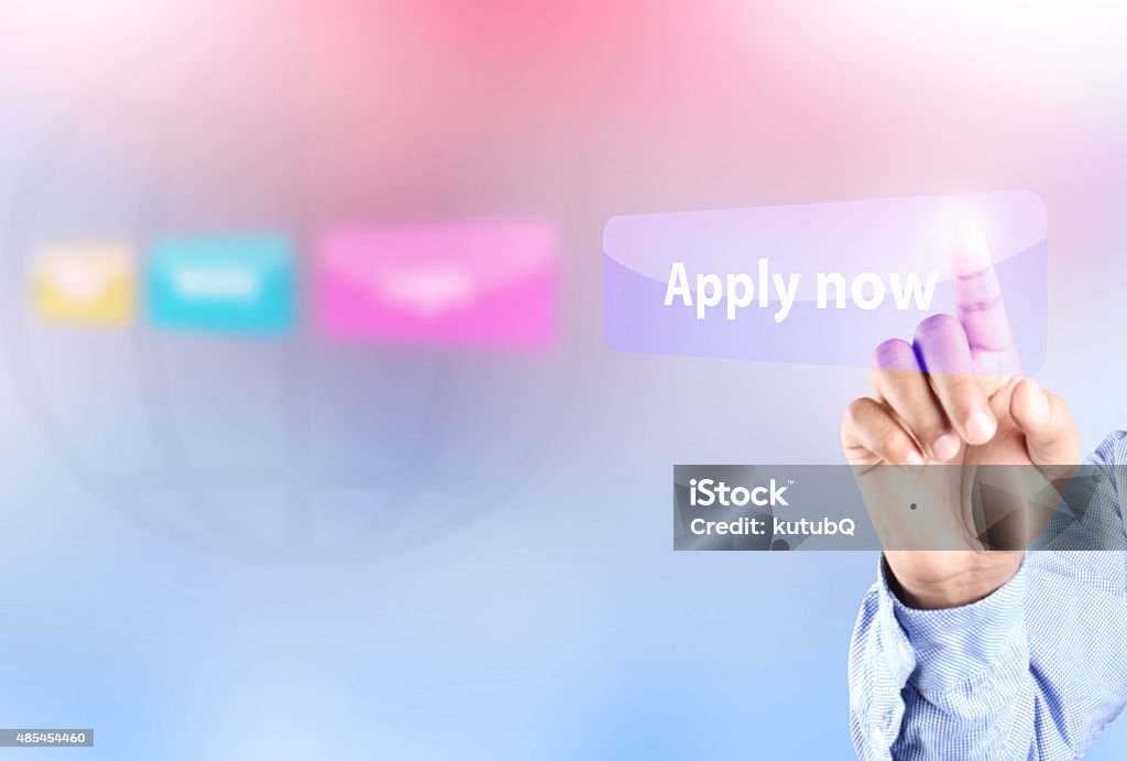 Hand pressing apply now button 2015 Stock Photo