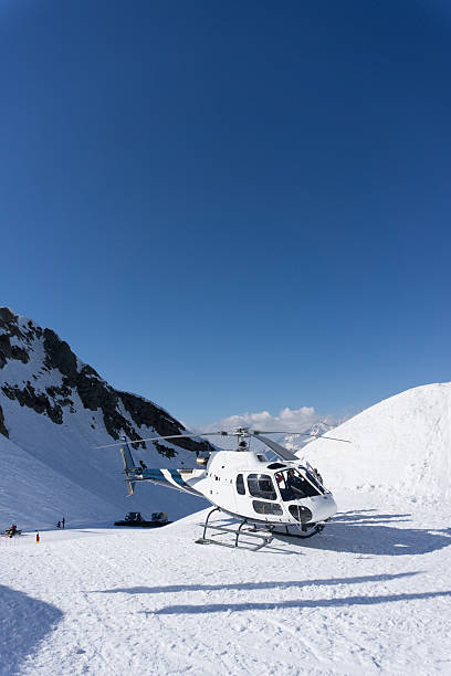 istock White rescue helicopter parked in the mountains 485456278