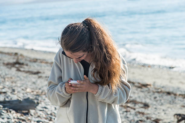 istock Taking a selfie with her phone in Homer, Alaska 485456912