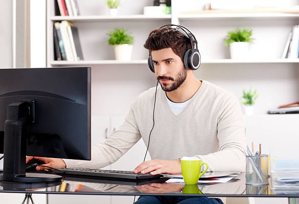istock Young businessman portrait with headphone 485457490