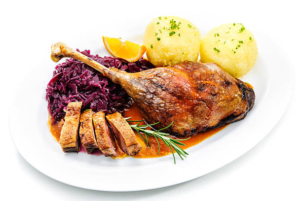 boże narodzenie gęś - goose roasted goose meat spit roasted zdjęcia i obrazy z banku zdjęć