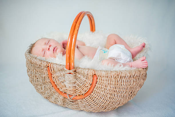 istock Happy newborn Baby in Basket 485464008