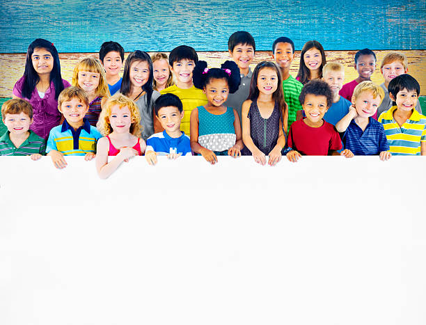 istock Multi-Ethnic Group of Children Holding Empty Billboard 485465388
