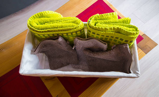 Basket with  towels on the  table