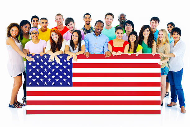 istock Large Group of People Holding American Flag Board 485468615