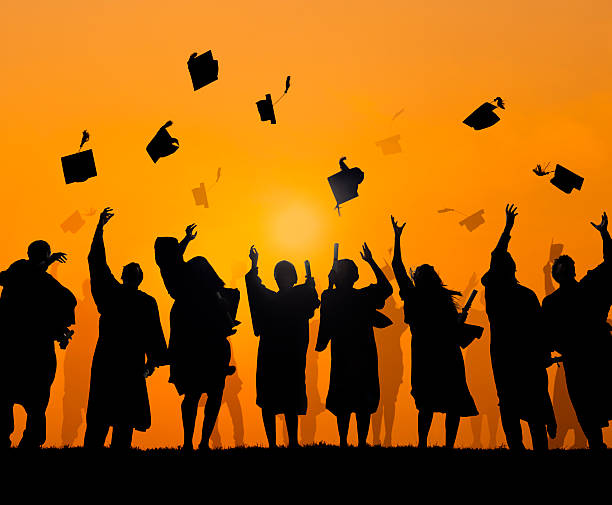 istock Group Of Diverse International Students Celebrating Graduation 485468663