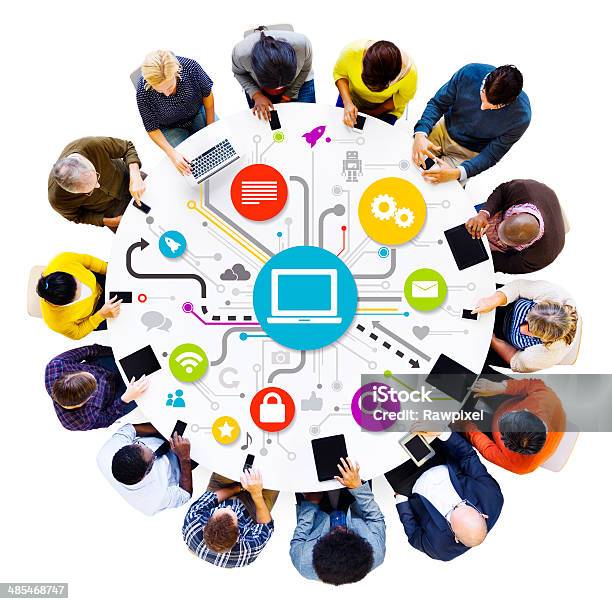 Social Networking Multiethnical People Around The Table With Th Stock Photo - Download Image Now