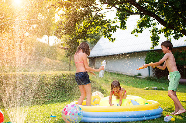 istock Children having fun outside in the garden 485469184