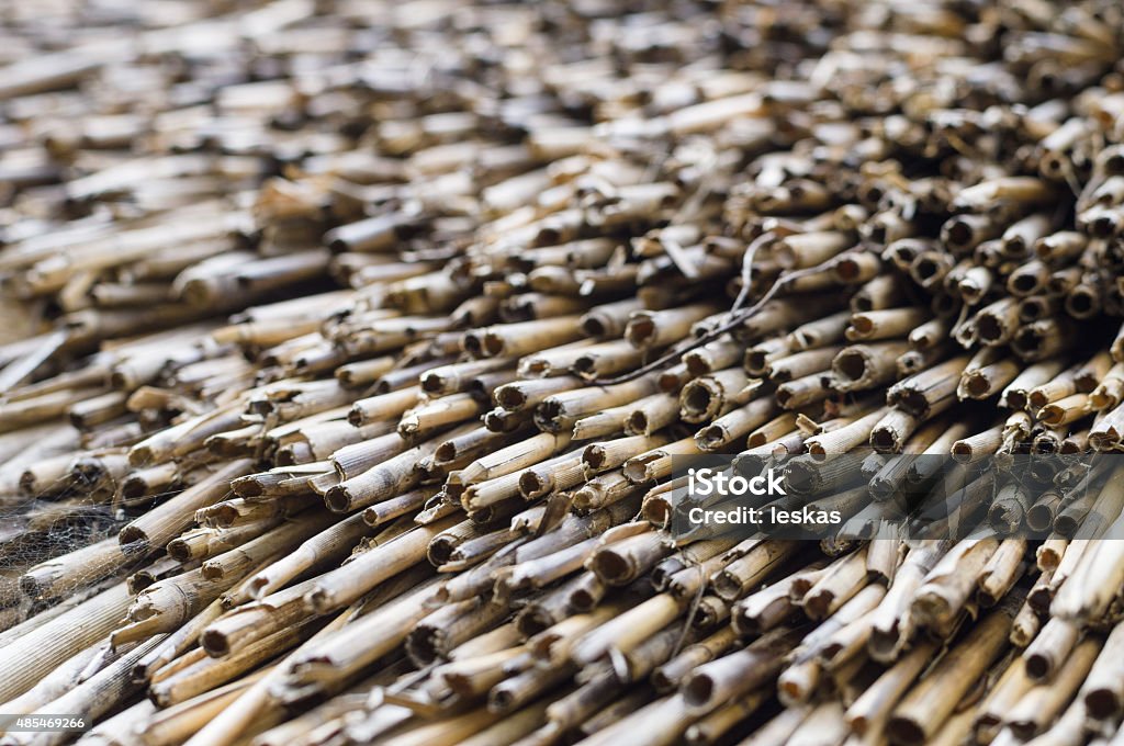 Weathered and dirty thatched roof straw closeup 2015 Stock Photo