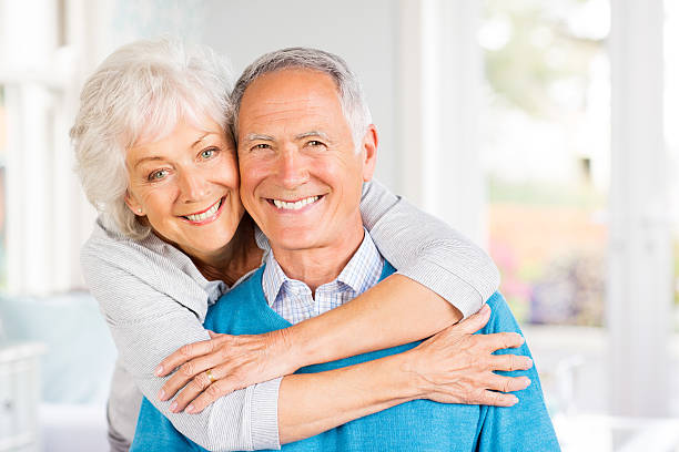 istock Cheerful Couple Embracing At Home. 485469407