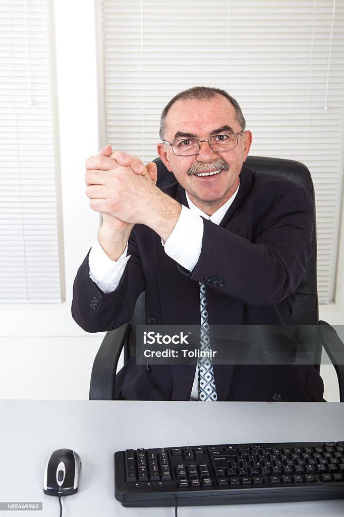 Good job Happy caucasian businessman in office with hands up Adult Stock Photo