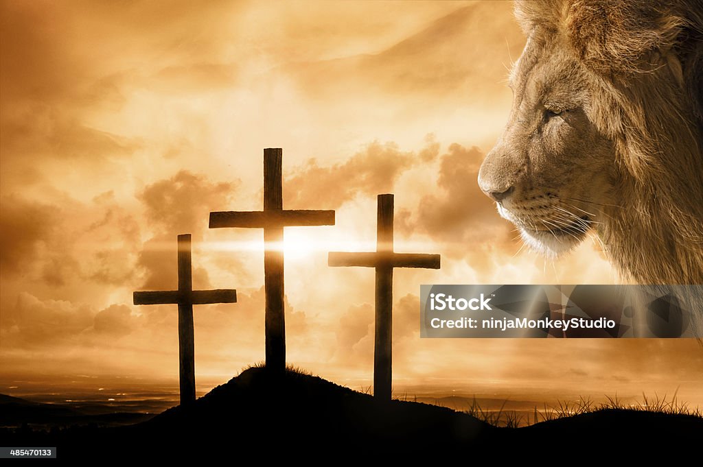 God's Victory at Calvary A brilliant sky illuminates the empty crosses on the day of Jesus' crucifixion. God, The Lion of Judah, overlooks the hill where His son Jesus died and won the victory for sinners. Haile Selassie Stock Photo
