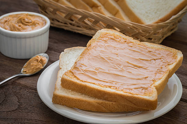 istock Peanut butter sandwich on plate 485471496