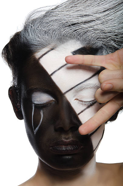 istock woman with musical face art and rock gesture 485471809