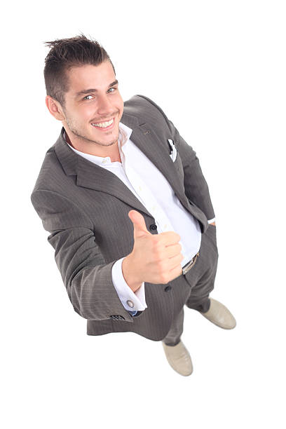 istock Happy smiling young business man with thumbs up gesture 485471949