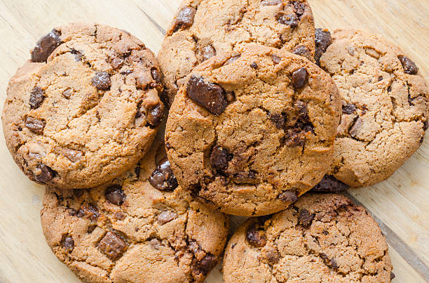 istock Chocolate chip cookies on wooden table 485472104