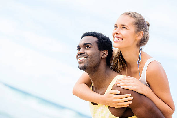 istock Happy couple at the beach 485472859