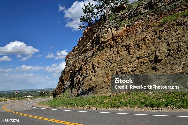 Rocky Mountain Road Stock Photo - Download Image Now - Beauty In Nature, Blue, Cloud - Sky