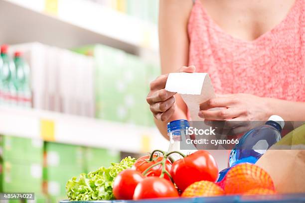 Supermarket Receipt Stock Photo - Download Image Now - 2015, Adult, Buying