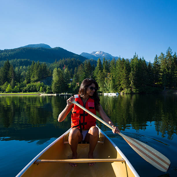 istock Canoeing on a prisitine mountain lake 485474346