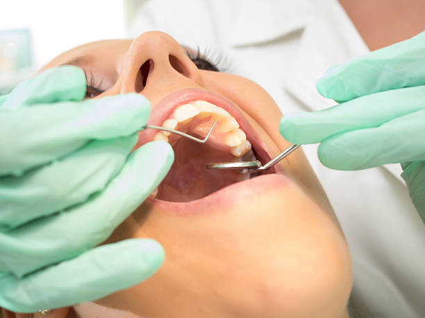 istock Girl at the dentist 485474400