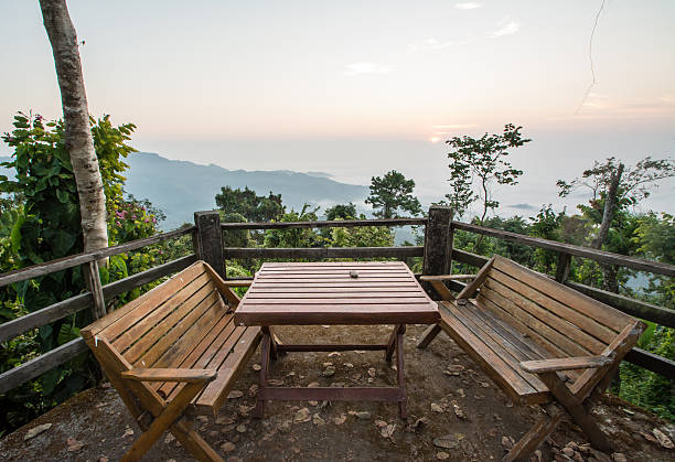 istock wood chair and table on balcony inthe morning 485477792