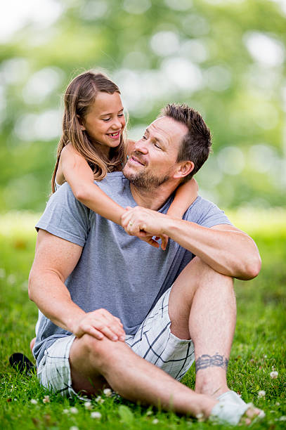 istock Father and Daughter Hugs 485478128