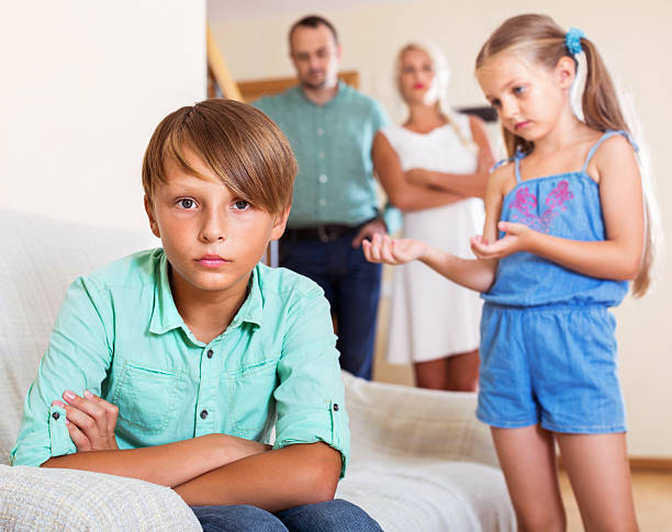 istock The younger sister is talking with his brother 485478426